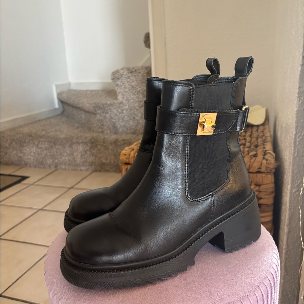 Steve Madden Black Ankle Booties with Gold Buckle